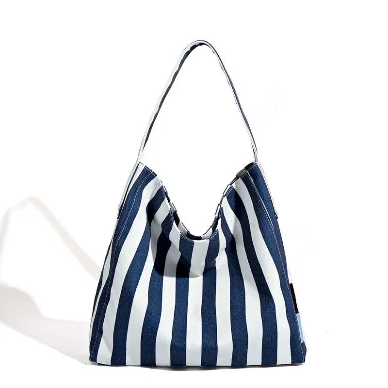 Original loose feeling canvas carry-on bag female large capacity striped computer bag student commuting shoulder bags new
Original loose feeling canvas carry-on bag female large capacity striped computer bag student commuting shoulder bags new