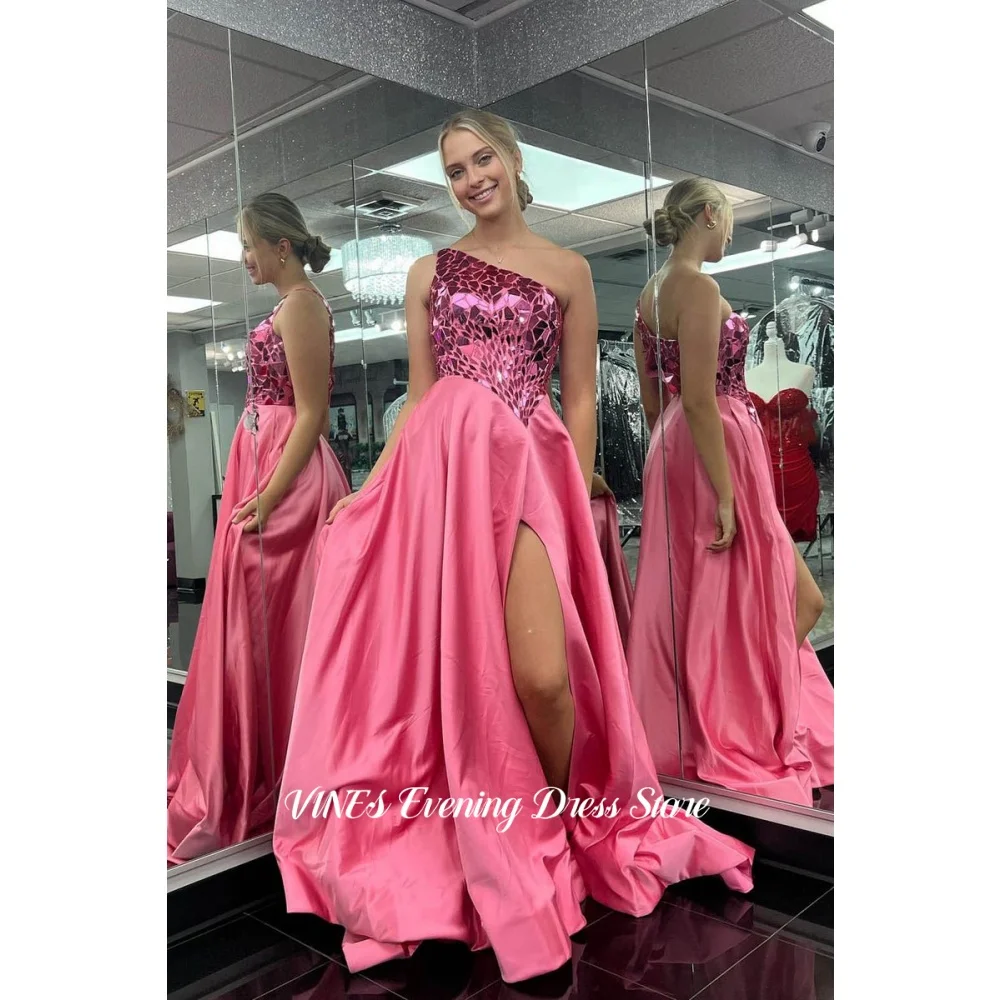 VINES Pink One-Shoulder Prom Dress Mirror Beaded Corset Evening Dress with High Slit Satin A-Line Formal Party Dress Customized
VINES Pink One-Shoulder Prom Dress Mirror Beaded Corset Evening Dress with High Slit Satin A-Line Formal Party Dress Customized