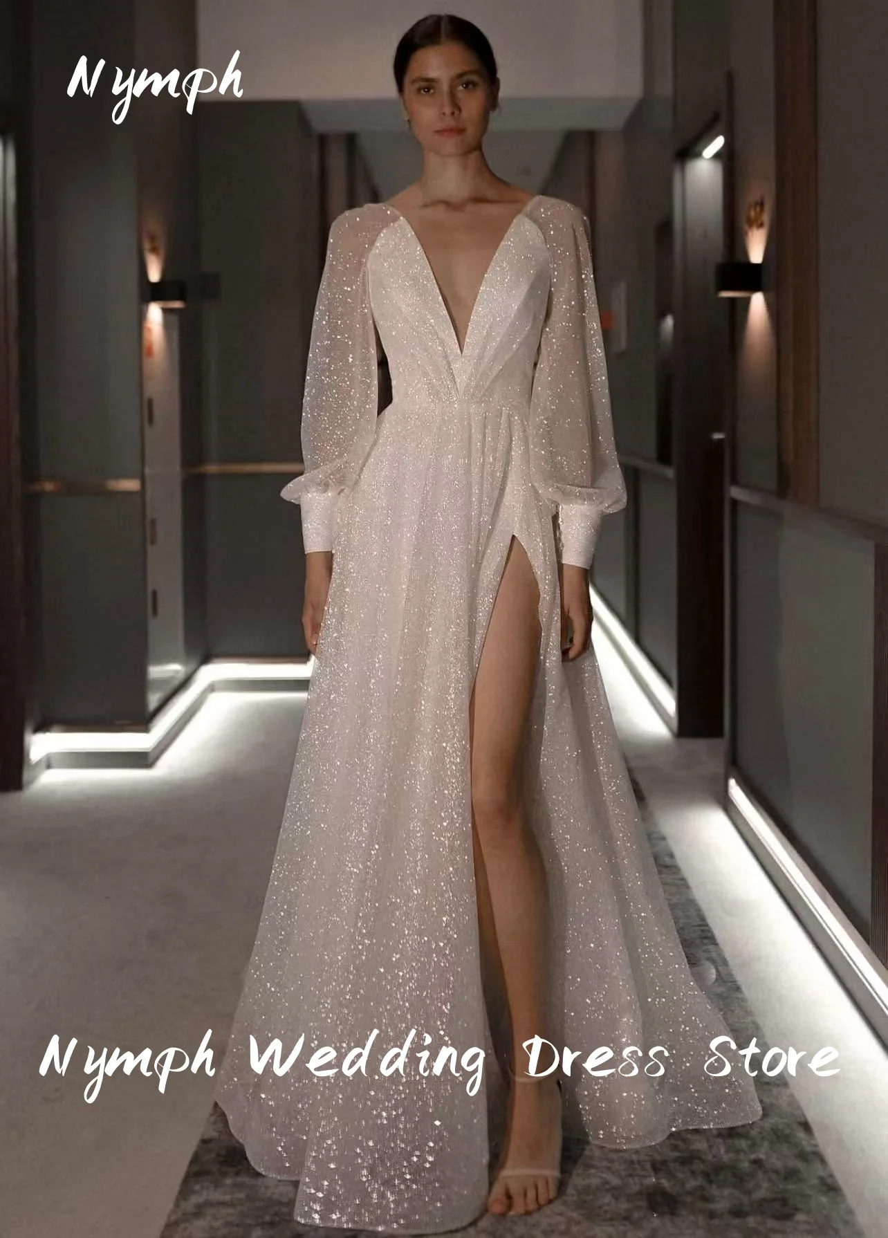 Nymph Boho Блестящие блестящие свадебные платья трапециевидной формы с глубоким V-образным вырезом и длинными рукавами Свадебное платье с высоким разрезом по бокам Пляжные платья Vestidos De Mariage
Nymph Boho Блестящие блестящие свадебные платья трапециевидной формы с глубоким V-образным вырезом и длинными рукавами Свадебное платье с высоким разрезом по бокам Пляжные платья Vestidos De Mariage