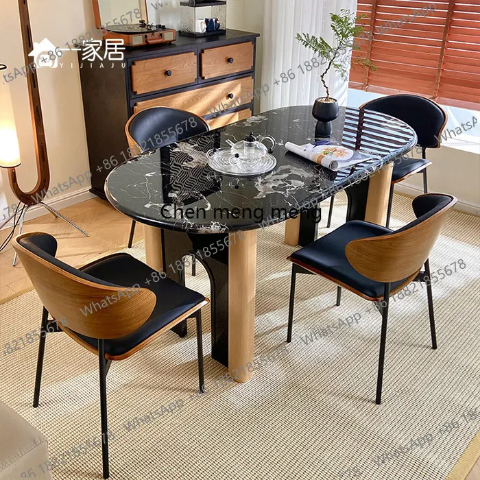 Nordic minimalist modern oval marble solid wood dining table and chair combination household minimalist cream style
Nordic minimalist modern oval marble solid wood dining table and chair combination household minimalist cream style