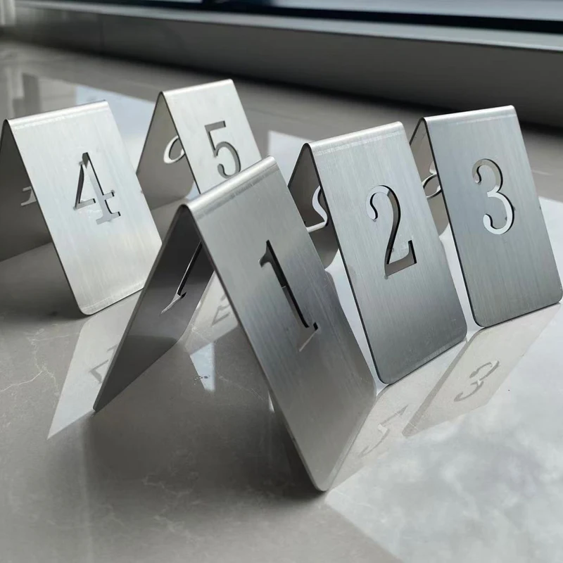 5Pcs/Set Double Sides Standing Table Numbers Stainless Steel Customized Desk Sign Plates Restaurant Cafe Bar Place Table Signs
5Pcs/Set Double Sides Standing Table Numbers Stainless Steel Customized Desk Sign Plates Restaurant Cafe Bar Place Table Signs