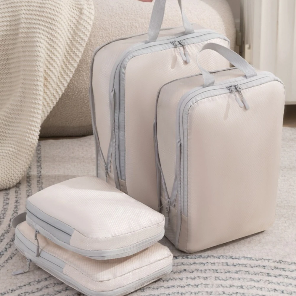 4-Piece Set Travel Clothing Storage Bags Compression Bags Expandable Travel Organizer for Clothing Toiletries Suitcase Organize
4-Piece Set Travel Clothing Storage Bags Compression Bags Expandable Travel Organizer for Clothing Toiletries Suitcase Organize