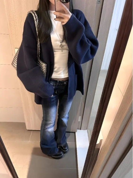 Осенний новый свободный крой V-Ne вязаный синий свитер пальто женский корейский Sle Long Sve повседневный высококачественный открытый кардиган
Осенний новый свободный крой V-Ne вязаный синий свитер пальто женский корейский Sle Long Sve повседневный высококачественный открытый кардиган