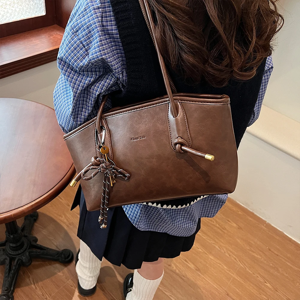PU Leather Shoulder Bag for Women W/ Pendant Shoulder Tote Handbag Trendy Purse Bag Stylish Tote Bag for Women Girls Work Travel
PU Leather Shoulder Bag for Women W/ Pendant Shoulder Tote Handbag Trendy Purse Bag Stylish Tote Bag for Women Girls Work Travel