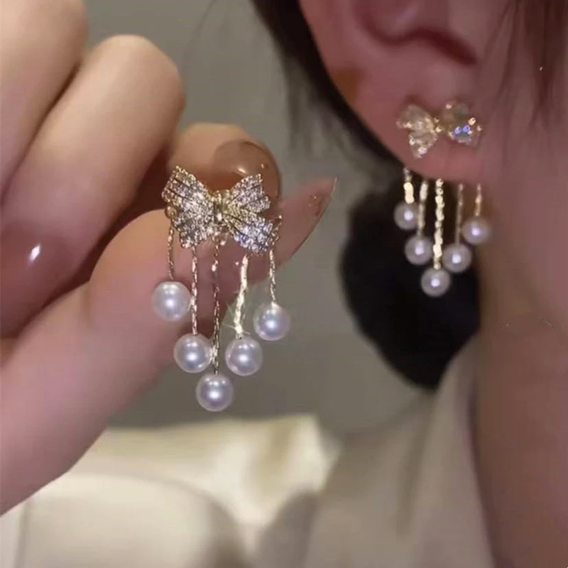 New Fashion Trend Bow Pearl Tassel Stud Earrings for Women Elegant and Exquisite Temperament Ladies Wedding Party Jewelry Gift
New Fashion Trend Bow Pearl Tassel Stud Earrings for Women Elegant and Exquisite Temperament Ladies Wedding Party Jewelry Gift