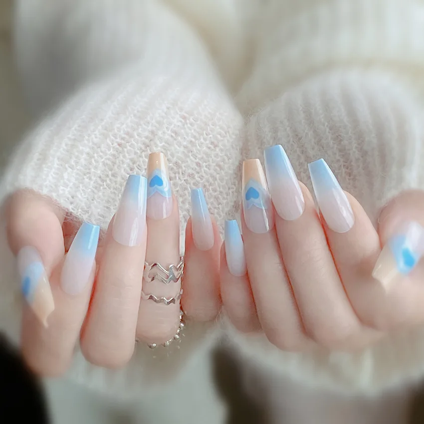 24pcs Blue and white color heart-shaped long false nails with gradient color and unique design
24pcs Blue and white color heart-shaped long false nails with gradient color and unique design