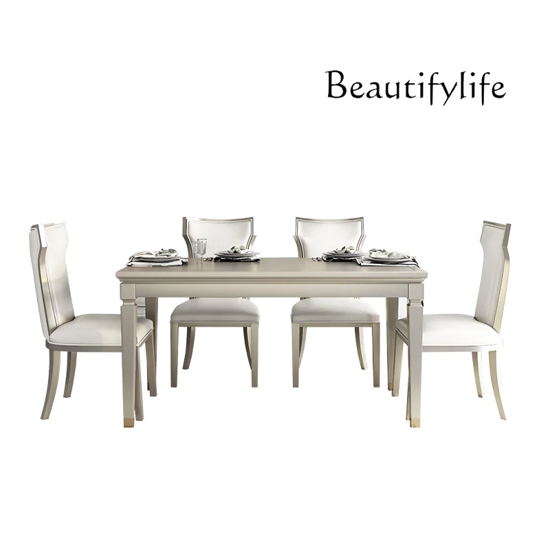 All solid wood dining table and chair combination American light luxury dining table household rectangular table modern 
All solid wood dining table and chair combination American light luxury dining table household rectangular table modern