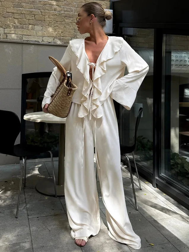 Женский комплект с широкими брюками Long Sve V-Ne irt, повседневная спортивная одежда с цветочной отделкой, костюм из двух предметов, материал полиэстер
Женский комплект с широкими брюками Long Sve V-Ne irt, повседневная спортивная одежда с цветочной отделкой, костюм из двух предметов, материал полиэстер