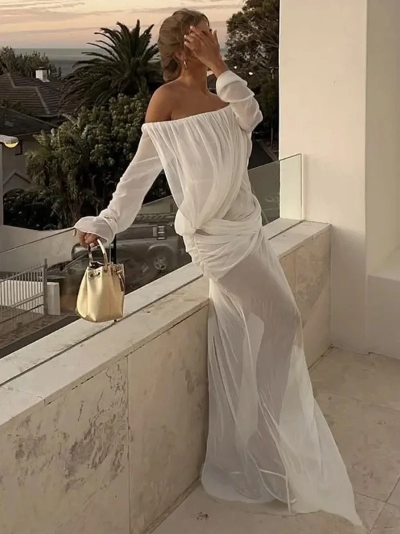 European and American Style 2025 Spring and Summer New Women's Sexy Mesh Solid Color One Shoulder See-through Long Sleeve Dress
European and American Style 2025 Spring and Summer New Women's Sexy Mesh Solid Color One Shoulder See-through Long Sleeve Dress