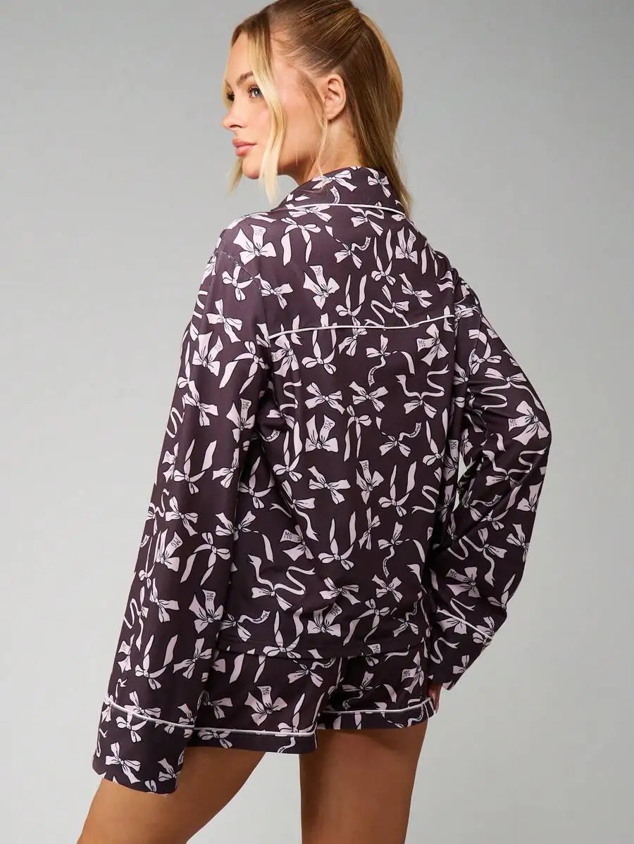 Bow Print Long Sleeve Button Front Pajama Set With Matching Shorts Sleepwear
Bow Print Long Sleeve Button Front Pajama Set With Matching Shorts Sleepwear