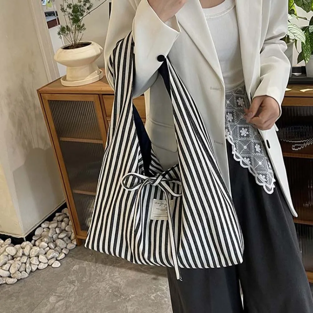 Sweet Double-sided Shoulder Pouch Contrast Color Large Capacity Stripe Cloth Vest Pouch Lightweight Bow Women Tote Bag Storage
Sweet Double-sided Shoulder Pouch Contrast Color Large Capacity Stripe Cloth Vest Pouch Lightweight Bow Women Tote Bag Storage