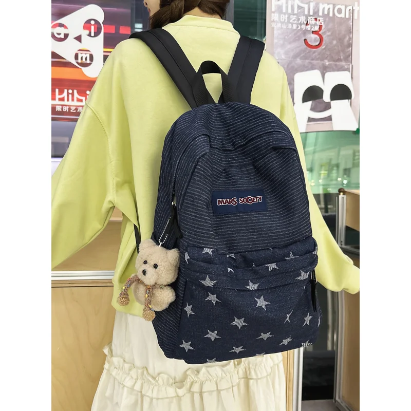 Korean-style denim backpack with color-blocking stripes and stars, suitable for female college students, versatile for commuting
Korean-style denim backpack with color-blocking stripes and stars, suitable for female college students, versatile for commuting