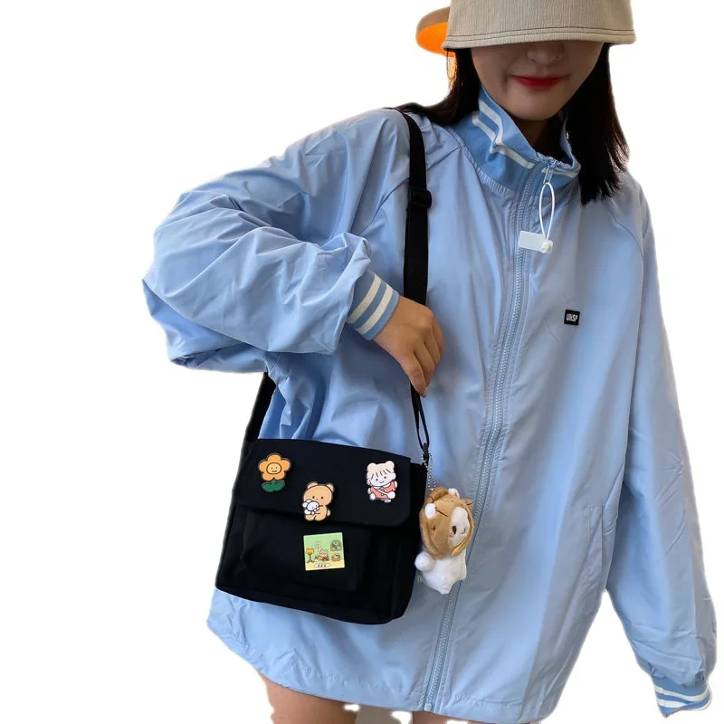 Adorable Canvas Crossbody Bags with Cute Pins Lightweight Shoulder Bags for Women, Ideal for School, Work & Everyday Outfits
Adorable Canvas Crossbody Bags with Cute Pins Lightweight Shoulder Bags for Women, Ideal for School, Work & Everyday Outfits
