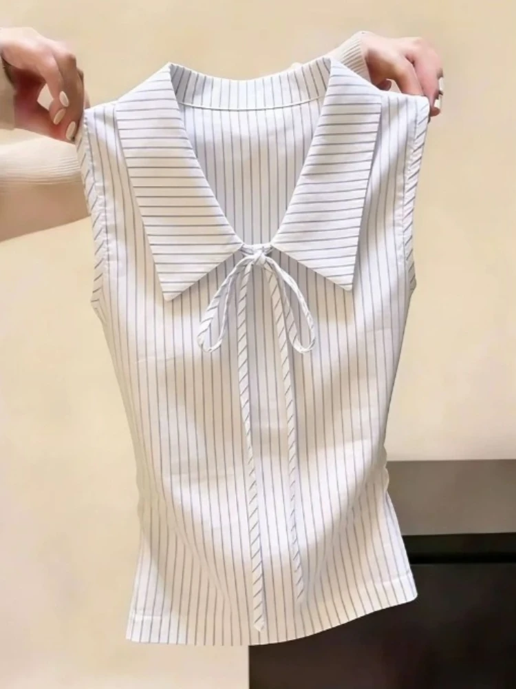 Korean Chic Shirts 2026 Blusas Mujer De Moda Sleeveless Tunic Blouses Crop Tops Bandage Turndown Collar Striped Summer Blouse
Korean Chic Shirts 2026 Blusas Mujer De Moda Sleeveless Tunic Blouses Crop Tops Bandage Turndown Collar Striped Summer Blouse