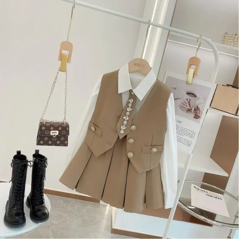 Girls Autumn Dress Set 2023 Children Two Piece Skirt Set Long-sleeved Shirt Fried Street Fashion Vest Skirt Girl Clothes Suit
Girls Autumn Dress Set 2023 Children Two Piece Skirt Set Long-sleeved Shirt Fried Street Fashion Vest Skirt Girl Clothes Suit