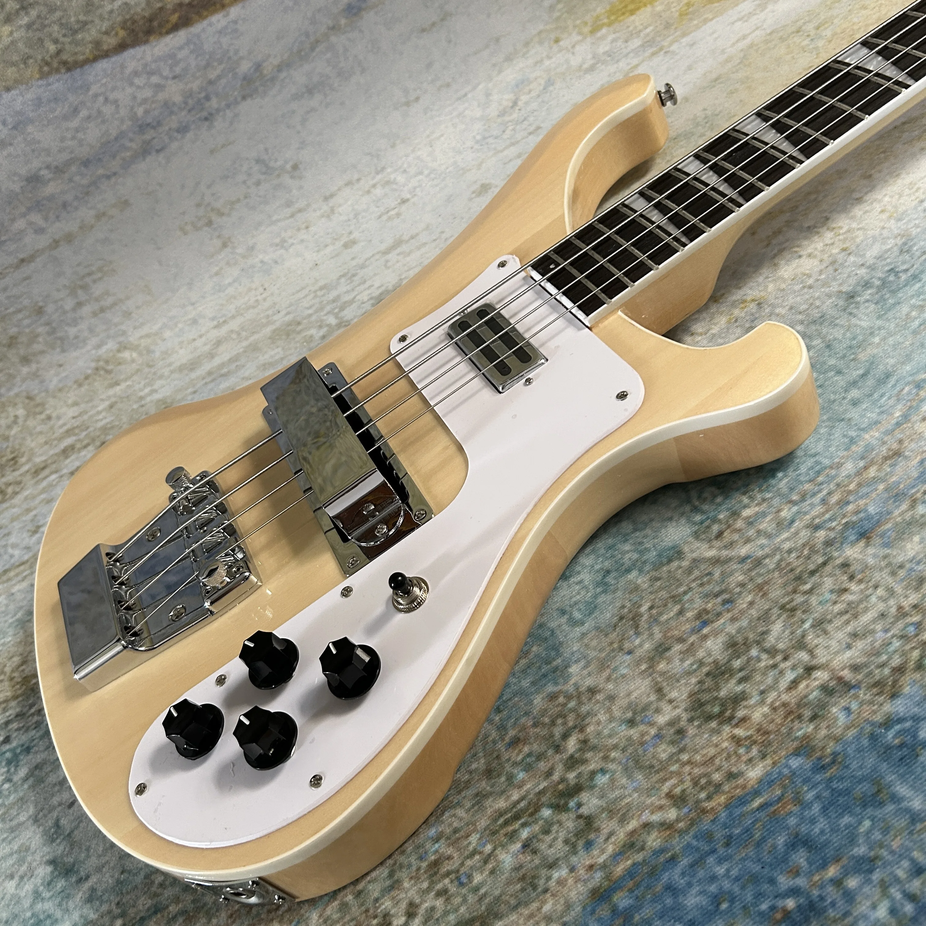 Hot Sale Bass Electric Guitars 4003 Version Natural Wood Color Rickenback High Quality
Hot Sale Bass Electric Guitars 4003 Version Natural Wood Color Rickenback High Quality