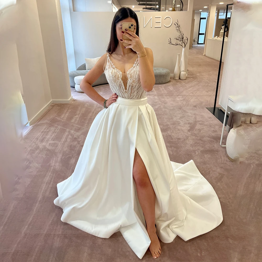 Shiny Beaded Sequined V-neck Satin A Line Wedding Dresses Side Slit Bridal Grown Custom Made 2025 Vestido De Noival
Shiny Beaded Sequined V-neck Satin A Line Wedding Dresses Side Slit Bridal Grown Custom Made 2025 Vestido De Noival