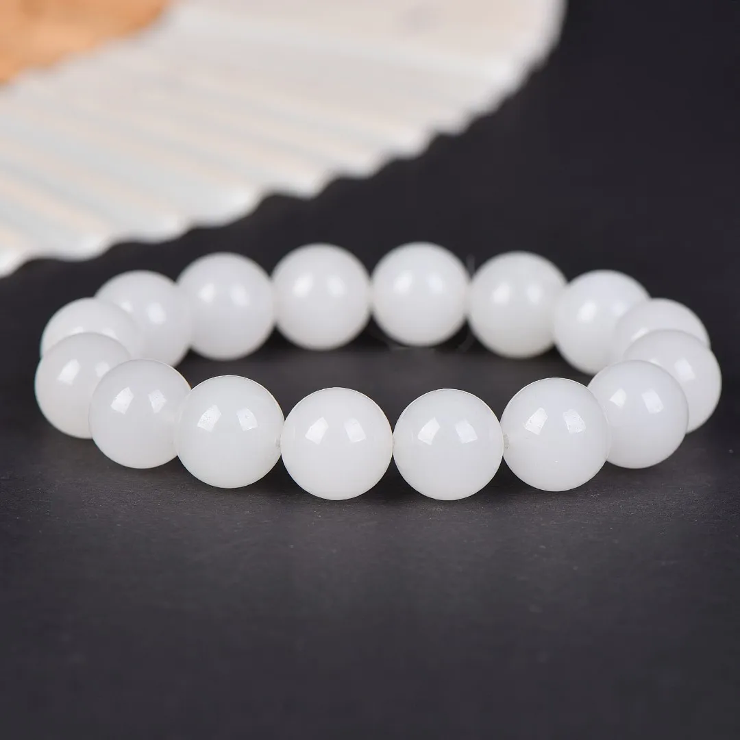 Tianshan emerald white jade Buddha bead jade bracelet monochrome gift for male and female students
Tianshan emerald white jade Buddha bead jade bracelet monochrome gift for male and female students