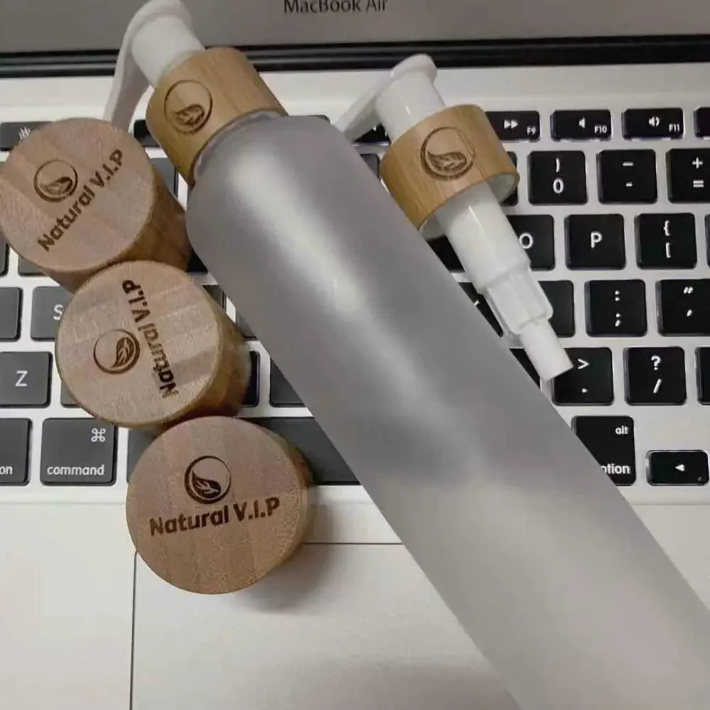 hot sale Engraving Logo On Frosted Clear Plastic Cosmetic Bottles Sample With Bamboo Wooden Lotion Lids Sprayer Dispenser Bottle
hot sale Engraving Logo On Frosted Clear Plastic Cosmetic Bottles Sample With Bamboo Wooden Lotion Lids Sprayer Dispenser Bottle