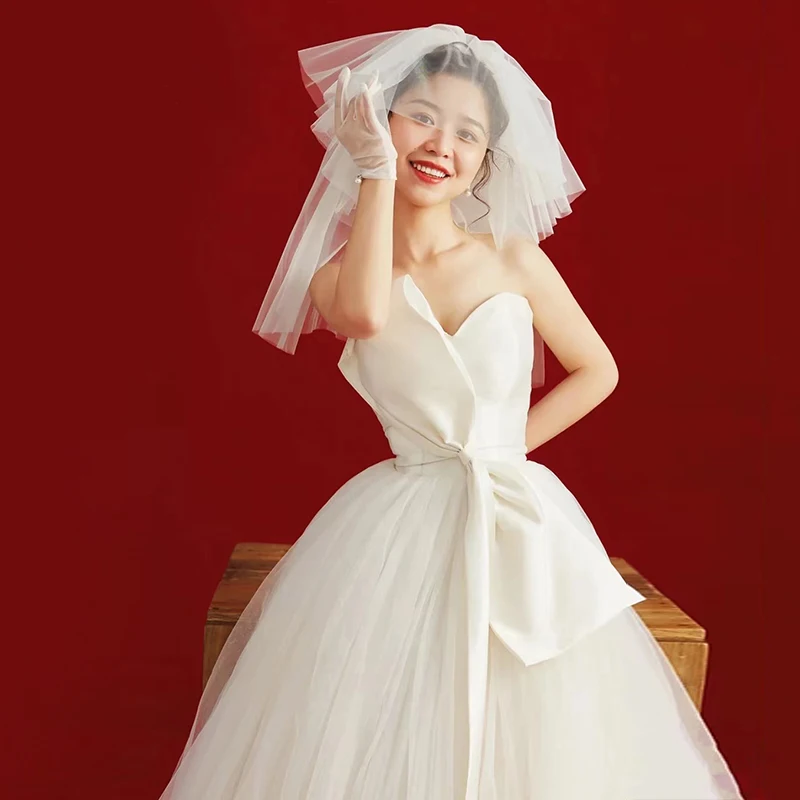 Elegant Satin Bridal Gown Strapless Long Tail Princess Style Wedding Dress for 18-25 Years Old Women Korean Style Flower Embr...
Elegant Satin Bridal Gown Strapless Long Tail Princess Style Wedding Dress for 18-25 Years Old Women Korean Style Flower Embr...