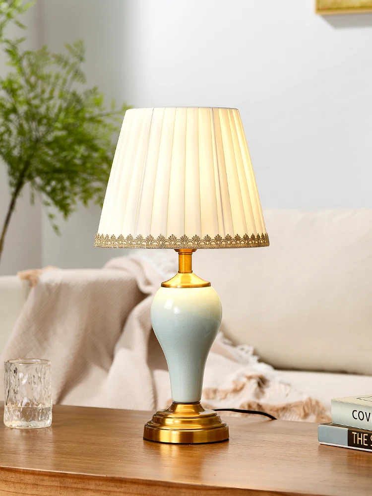 Simple modern ceramic table lamp bedroom bedside creative high-end sense home retro light luxury living room study ornament
Simple modern ceramic table lamp bedroom bedside creative high-end sense home retro light luxury living room study ornament
