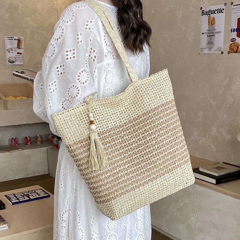 Summer Seaside Resort Style Hand-Held Straw Woven Bag for Women 2026 New Versatile Large-Capacity Bohemian Style Shoulder Woven Bag Tote Bag
Summer Seaside Resort Style Hand-Held Straw Woven Bag for Women 2026 New Versatile Large-Capacity Bohemian Style Shoulder Woven Bag Tote Bag