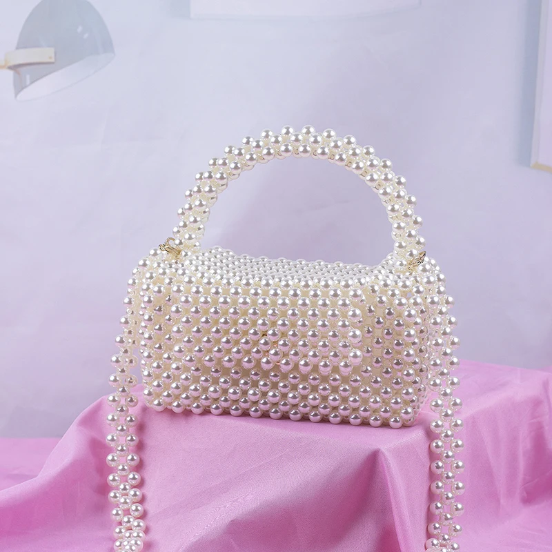 New Large Imitation Pearl Pillow Designer Bags Handbeaded Weaving Casual Purses and Handbags Portable Messenger Shoulder Handbag
New Large Imitation Pearl Pillow Designer Bags Handbeaded Weaving Casual Purses and Handbags Portable Messenger Shoulder Handbag