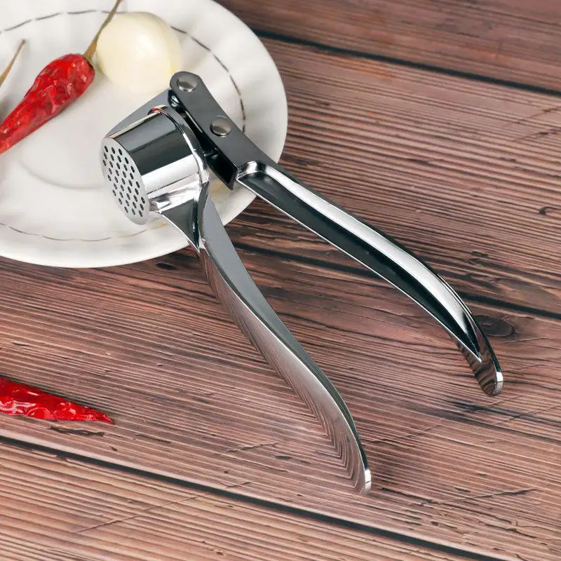 Stainless Steel Manual Garlic Press Kitchen Tool for Home Use Garlic Paste Maker Peeler Skin Remover Easy to Clean
Stainless Steel Manual Garlic Press Kitchen Tool for Home Use Garlic Paste Maker Peeler Skin Remover Easy to Clean