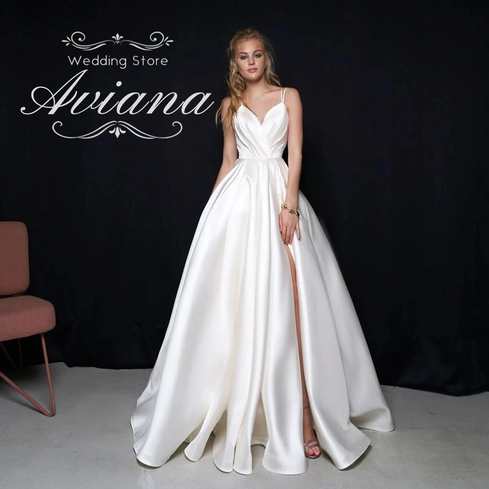Customized Aviana Spaghetti Strap Deep V Neck Satin High Slit Ball Gown Wedding Dress Open Back Minimalist Style Handmade 2025
Customized Aviana Spaghetti Strap Deep V Neck Satin High Slit Ball Gown Wedding Dress Open Back Minimalist Style Handmade 2025