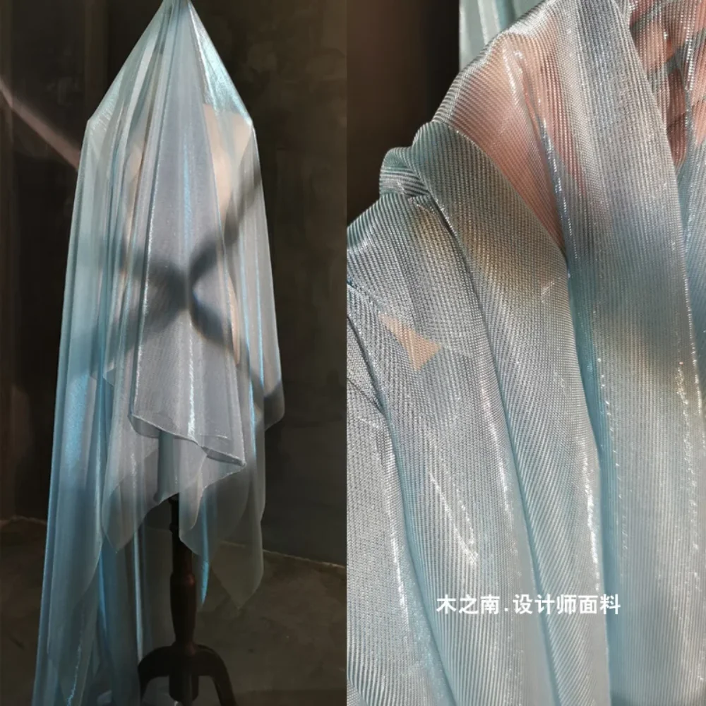 Небесно-голубая лазерная выдолбленная сетчатая ткань, прозрачное платье, меняющее цвет, дизайнерская одежда для сцены, материал для шитья своими руками, ткань
Небесно-голубая лазерная выдолбленная сетчатая ткань, прозрачное платье, меняющее цвет, дизайнерская одежда для сцены, материал для шитья своими руками, ткань