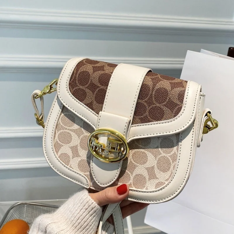 New minimalist and fashionable small handbag, contrasting color women's bag, high-end carriage crossbody bag, portable box bag
New minimalist and fashionable small handbag, contrasting color women's bag, high-end carriage crossbody bag, portable box bag