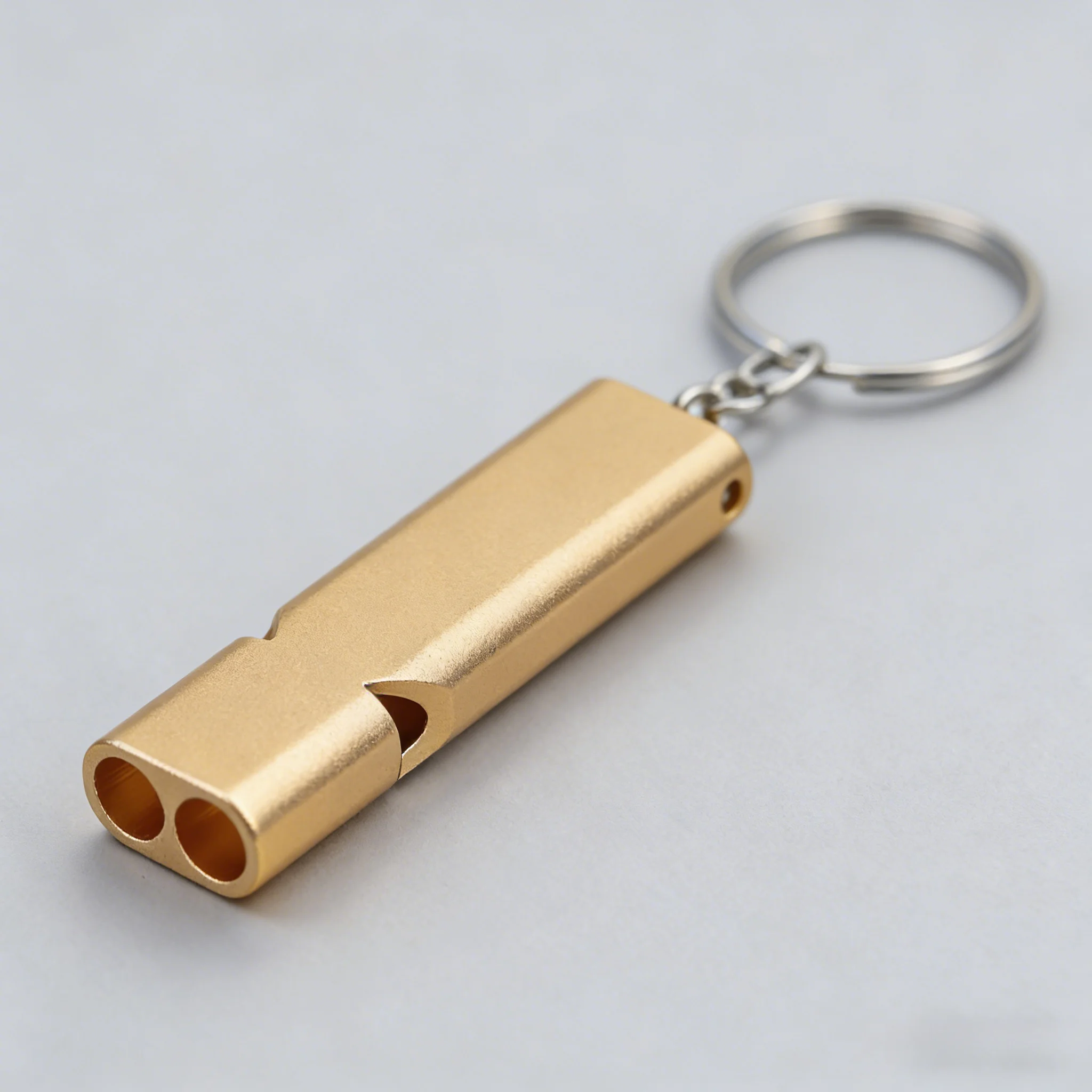 Golden Survival Whistle Keychain with Metal Chain – Emergency Whistle Function, High‑Decibel Sound Output, Durable Metal Alloy.
Golden Survival Whistle Keychain with Metal Chain – Emergency Whistle Function, High‑Decibel Sound Output, Durable Metal Alloy.