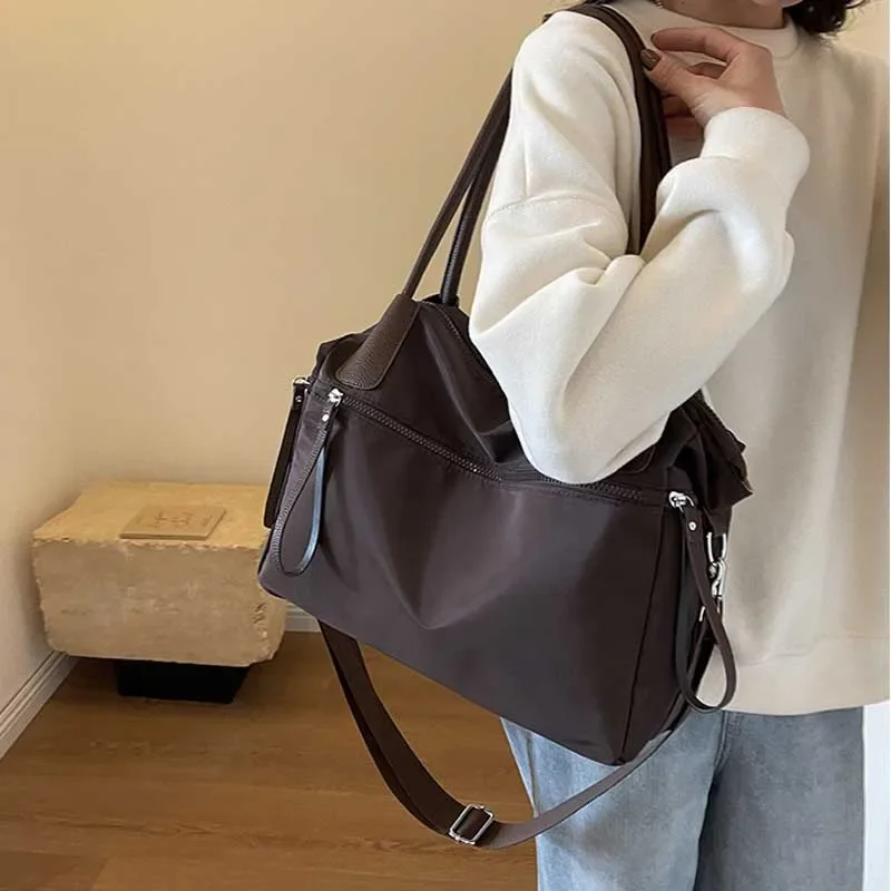 Vintage nylon women's messenger bag, large-capacity waterproof messenger bag, daily commuting handbag
Vintage nylon women's messenger bag, large-capacity waterproof messenger bag, daily commuting handbag