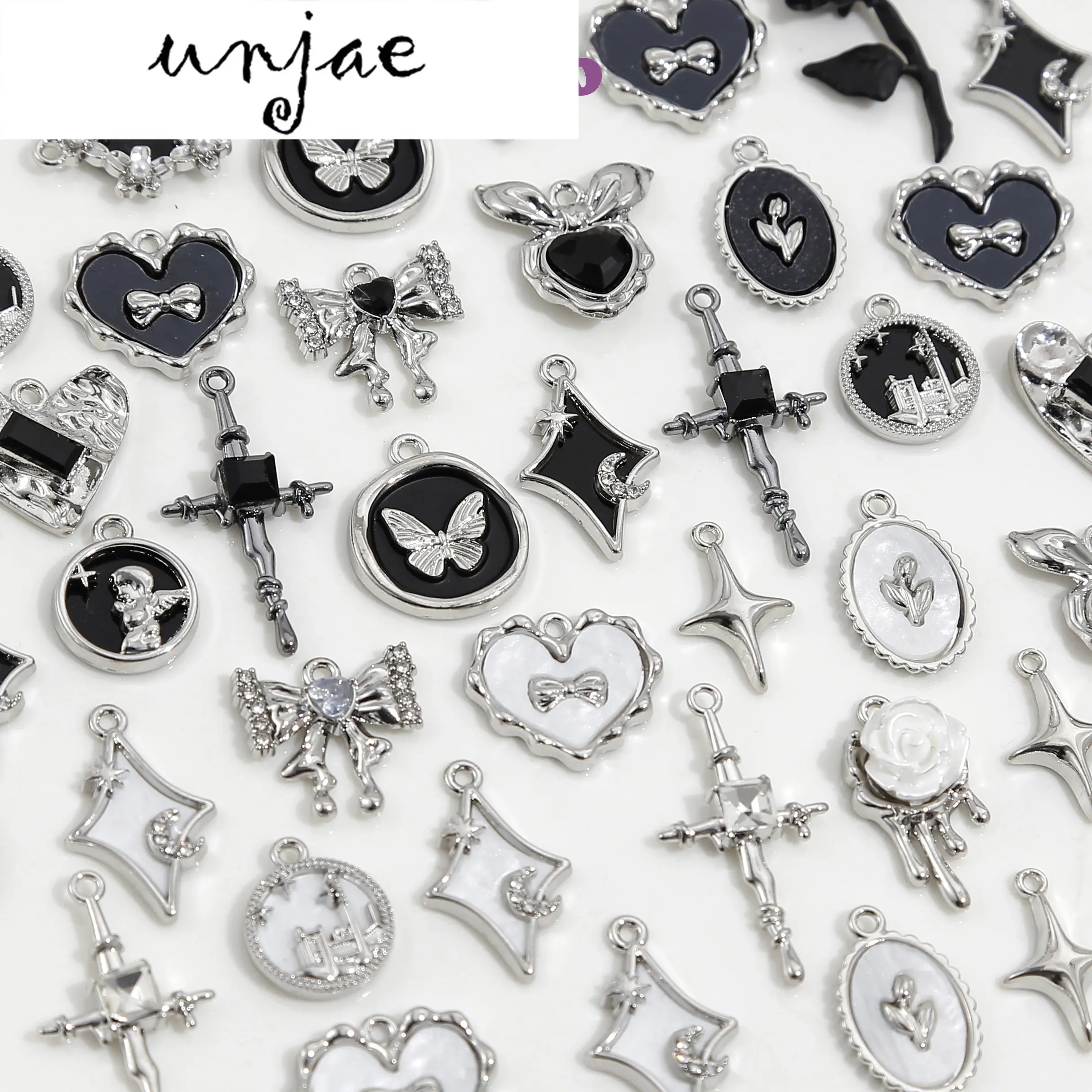 Sweet and cool ins wind black and white series love bow cross pendant necklace diy handmade beaded bracelet material
Sweet and cool ins wind black and white series love bow cross pendant necklace diy handmade beaded bracelet material
