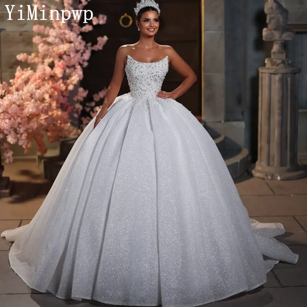 Sparkling Ball Gown Wedding Dresses for Bride Strapless Lace up Closure Crystal Sequined Arabic Women Bridal Gowns Customized
Sparkling Ball Gown Wedding Dresses for Bride Strapless Lace up Closure Crystal Sequined Arabic Women Bridal Gowns Customized