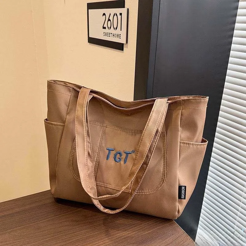 New Large Capacity Canvas Tote Bag Women Casual Fashion Lightweight Commuter Single Shoulder Bag Versatile Daily Use Handbag
New Large Capacity Canvas Tote Bag Women Casual Fashion Lightweight Commuter Single Shoulder Bag Versatile Daily Use Handbag