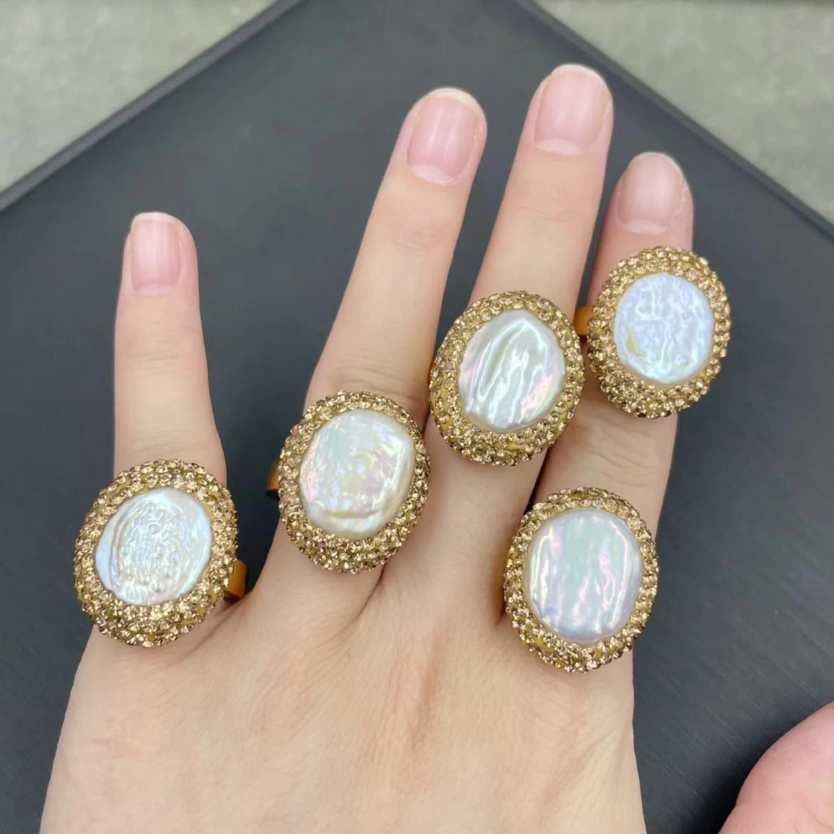 Natural Baroque pearls, handmade inlaid hemming rings, wholesale rings from European and American personalized origins
Natural Baroque pearls, handmade inlaid hemming rings, wholesale rings from European and American personalized origins