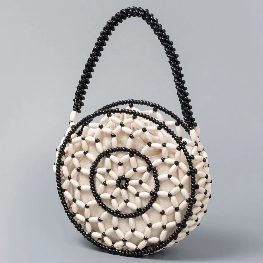 Женская сумка из бисера, изысканный дизайн, маленькая круглая сумка из деревянных бусин, женская летняя сумка для вечеринки, отпуска
Женская сумка из бисера, изысканный дизайн, маленькая круглая сумка из деревянных бусин, женская летняя сумка для вечеринки, отпуска