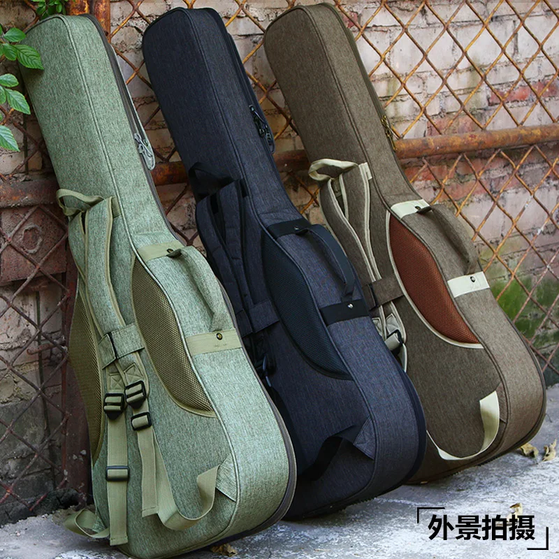 Ruiz Ruiz thickened guitar bag double shoulder bag 39 inch 40 inch 41 inch waterproof and shockproof folk guitar bag
Ruiz Ruiz thickened guitar bag double shoulder bag 39 inch 40 inch 41 inch waterproof and shockproof folk guitar bag