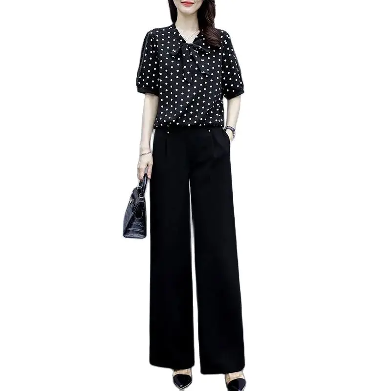 Chiffon Shirt Suit 2022 Summer Female Short Sleeve Shirt Women's Fashion Thin Print Top + Black Wide Leg Pants Two Piece Set
Chiffon Shirt Suit 2022 Summer Female Short Sleeve Shirt Women's Fashion Thin Print Top + Black Wide Leg Pants Two Piece Set