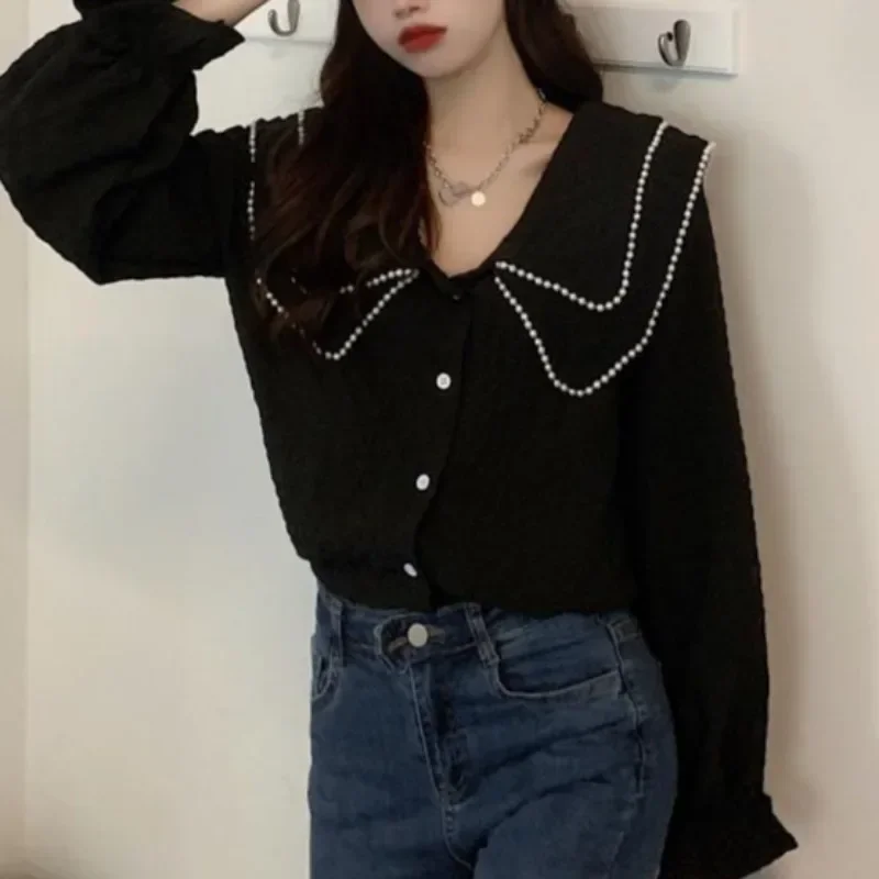 Peter Pan Collar Shirts for Women All-match Loose Casual Korean Style Black Single Breasted Pearl Chic Young Fashion Spring Tops
Peter Pan Collar Shirts for Women All-match Loose Casual Korean Style Black Single Breasted Pearl Chic Young Fashion Spring Tops
