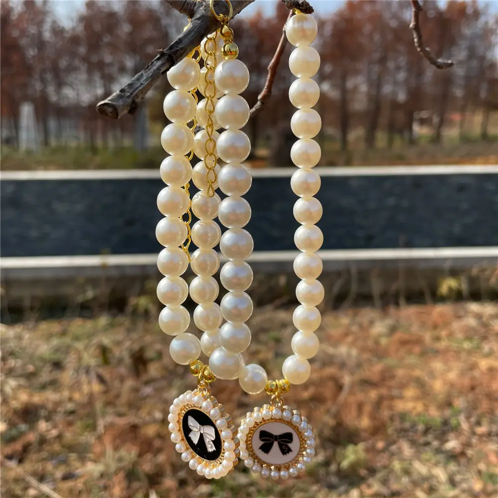 1pc Hot Sale Pearl Cute Dog Necklace Pet Collar Accessories Jewelry Neck Pearl Disc Pendant for For Small Dogs Large Dog Cats
1pc Hot Sale Pearl Cute Dog Necklace Pet Collar Accessories Jewelry Neck Pearl Disc Pendant for For Small Dogs Large Dog Cats