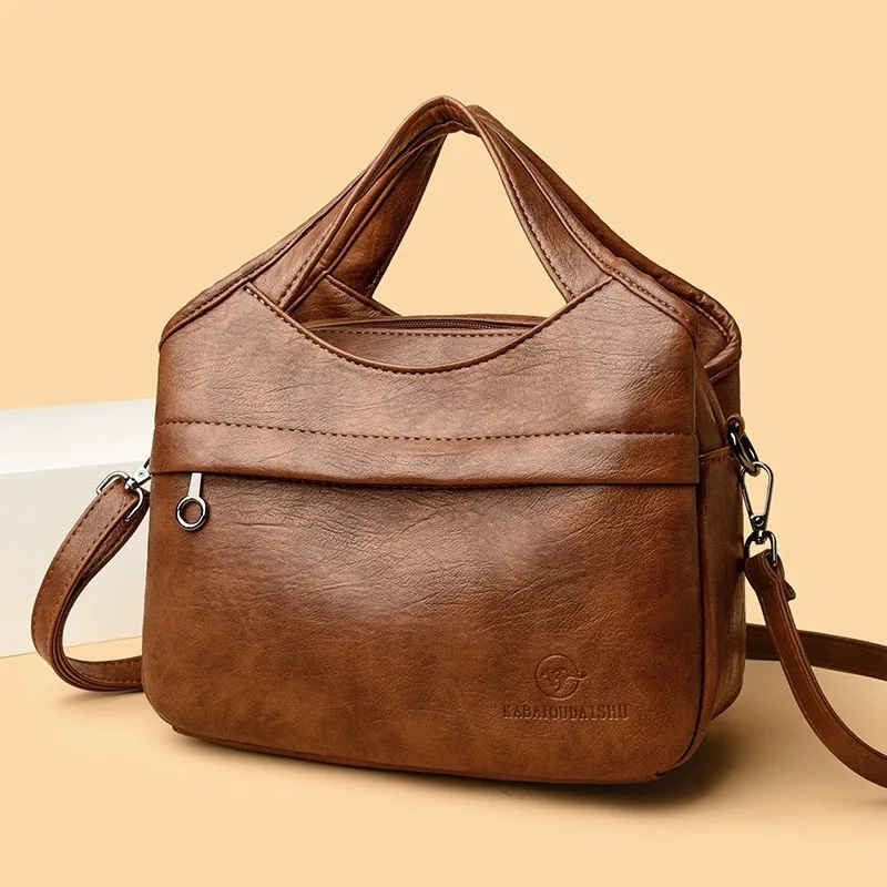 Женская сумка через плечо из мягкой искусственной кожи в стиле ретро, вместительная сумка для поездок на работу, многофункциональная модная сумка на одно плечо.
Женская сумка через плечо из мягкой искусственной кожи в стиле ретро, вместительная сумка для поездок на работу, многофункциональная модная сумка на одно плечо.