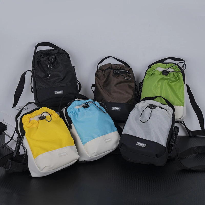 Цельная многофункциональная сумка через плечо на шнурке, плиссированная маленькая сумка, сумка через плечо из нейлоновой ткани для повседневного отдыха на открытом воздухе 
Цельная многофункциональная сумка через плечо на шнурке, плиссированная маленькая сумка, сумка через плечо из нейлоновой ткани для повседневного отдыха на открытом воздухе