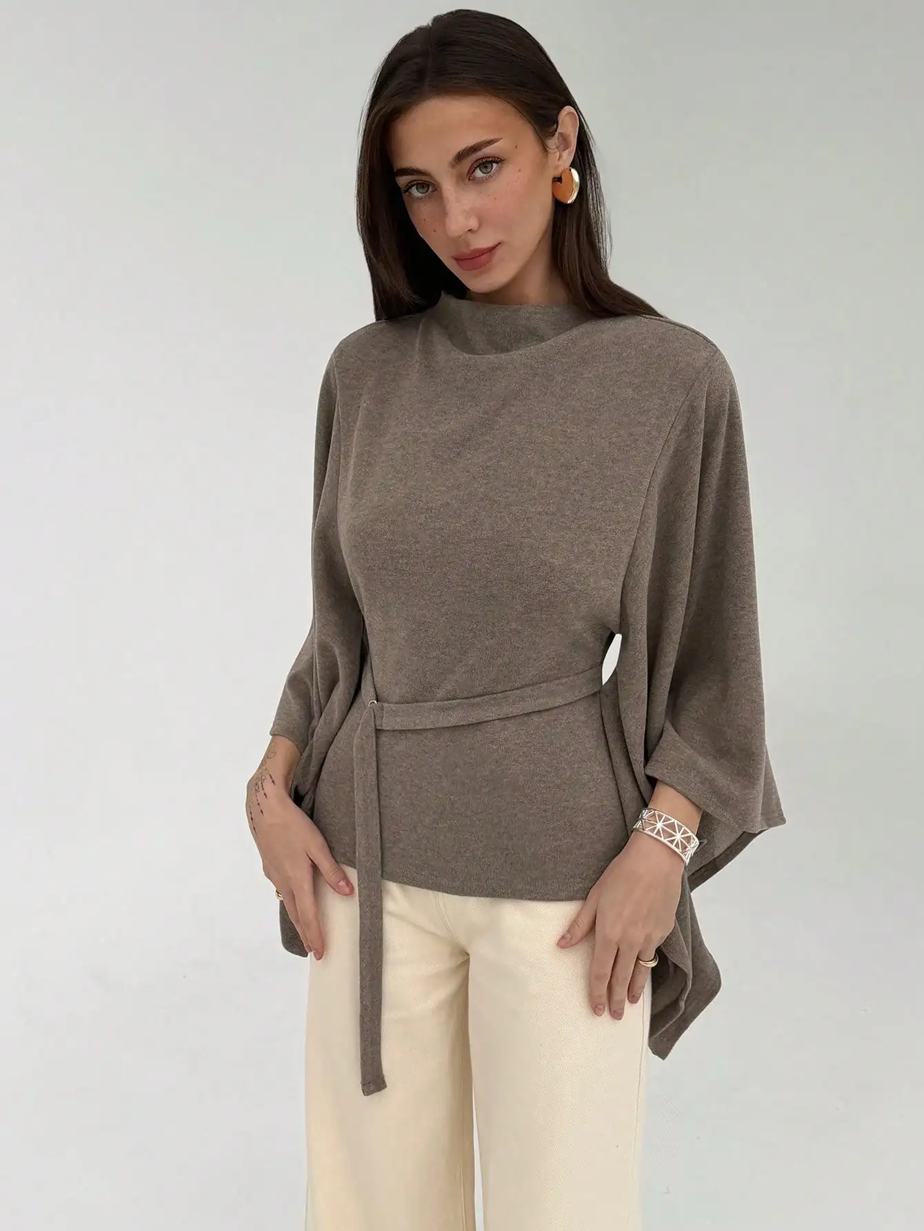 Women Solid Color Stand Collar Flare Sleeve Belted Casual Top Autumn Winter
Women Solid Color Stand Collar Flare Sleeve Belted Casual Top Autumn Winter