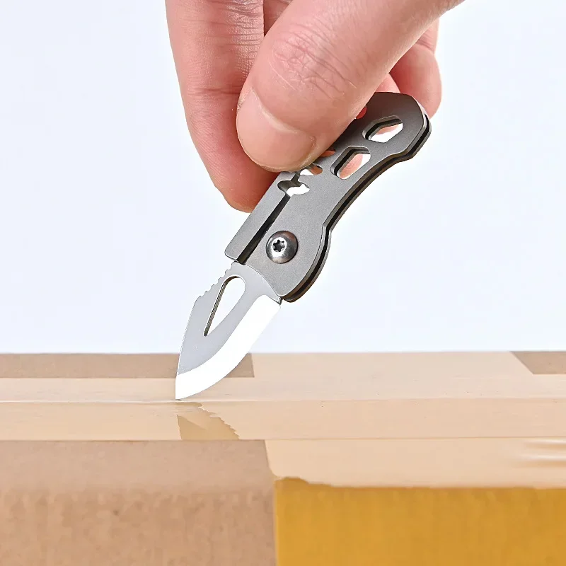 Titanium Alloy Handle Sharp Mini Folding Blade Knife D2 Steel Portable Unpacking Express Keychain Tool EDC Knife Survival
Titanium Alloy Handle Sharp Mini Folding Blade Knife D2 Steel Portable Unpacking Express Keychain Tool EDC Knife Survival