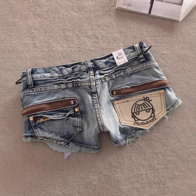 Летние американские модные уличные шорты на молнии, ультра джинсовые шорты, женские облегающие шорты для пикантных девушек, сексуальные женские джинсы с низкой талией и подтяжкой бедер 
Летние американские модные уличные шорты на молнии, ультра джинсовые шорты, женские облегающие шорты для пикантных девушек, сексуальные женские джинсы с низкой талией и подтяжкой бедер