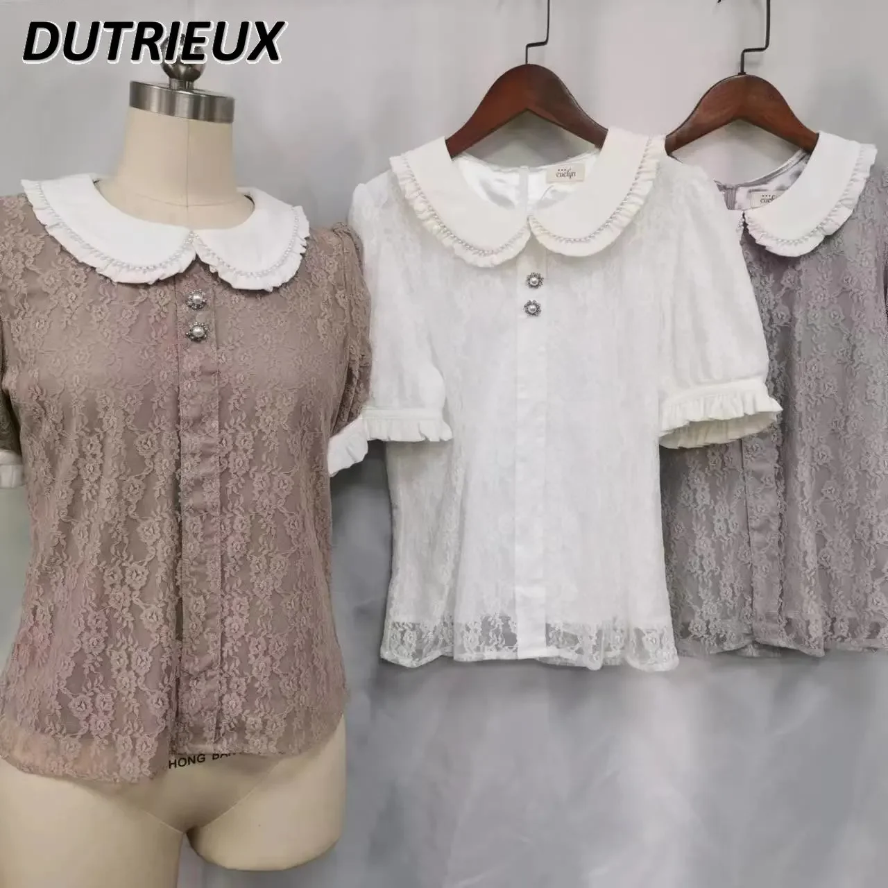 Kawaii Girl Doll Collar Lace Blouse Summer Sweet Pearl Ribbon Mass-Produced Short Sleeve Shirt Top for Women Blusas Mujer
Kawaii Girl Doll Collar Lace Blouse Summer Sweet Pearl Ribbon Mass-Produced Short Sleeve Shirt Top for Women Blusas Mujer