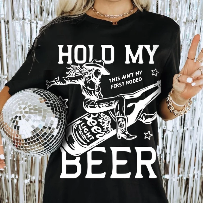 Hold My Beer Tee Vintage Beer Shirt Not My First Rodeo American Boho Cowgirl Raising Hell Tee Western Graphic Wild West USA Tops
Hold My Beer Tee Vintage Beer Shirt Not My First Rodeo American Boho Cowgirl Raising Hell Tee Western Graphic Wild West USA Tops