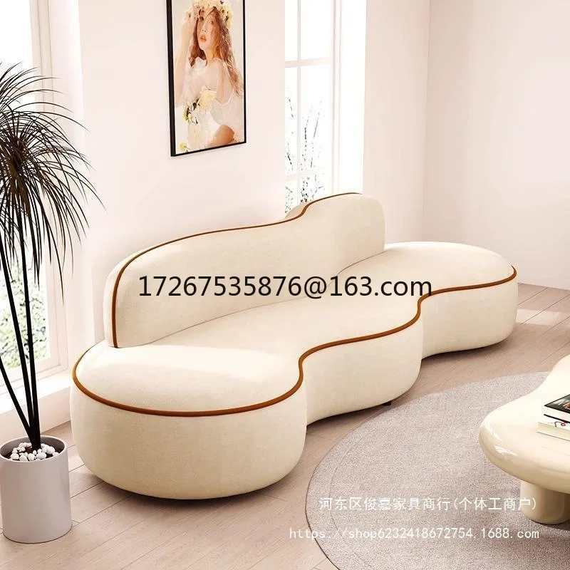 Curved cream style lambswool bridal shop reception clothing store lazy corner sofa
Curved cream style lambswool bridal shop reception clothing store lazy corner sofa